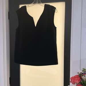 Ikks Paris, black shell, v-back w/silver grommet details